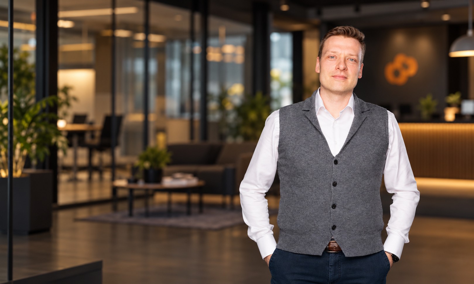 Ivan Nokhrin standing in an office lobby